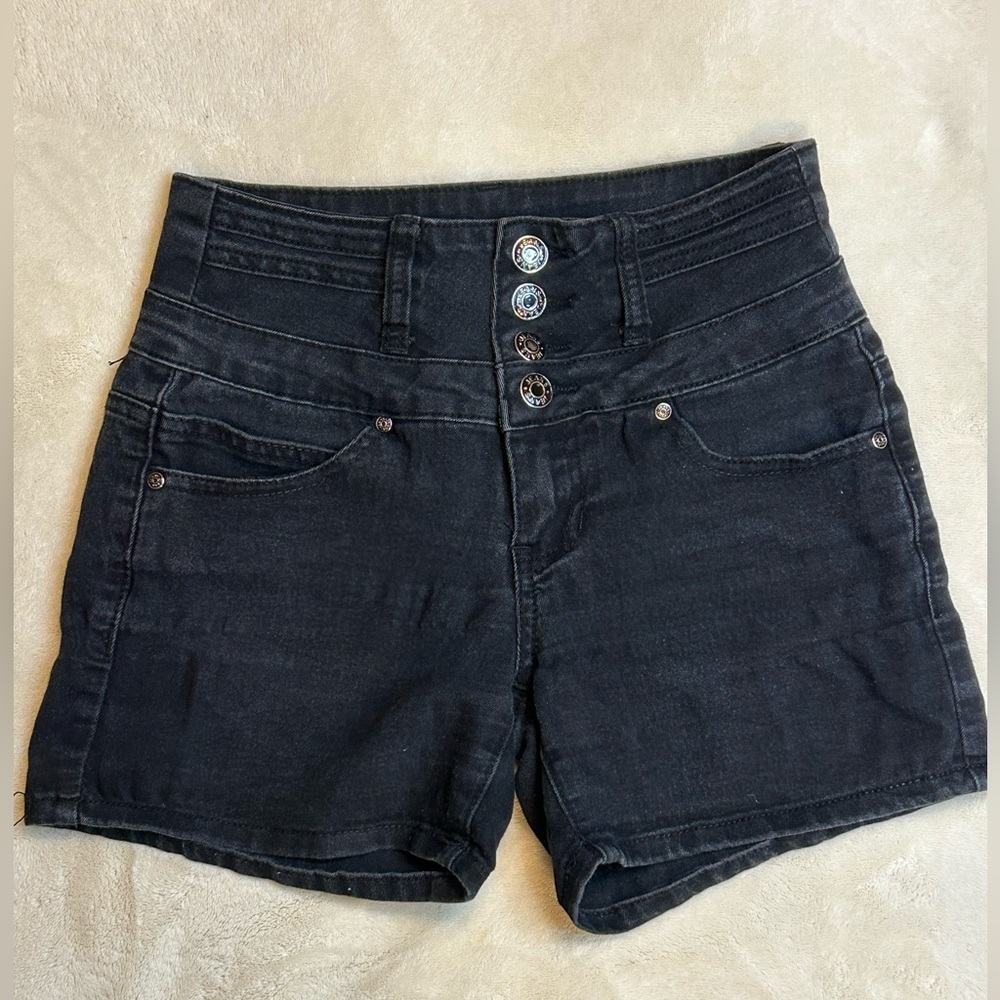 Black high waist denim shorts.